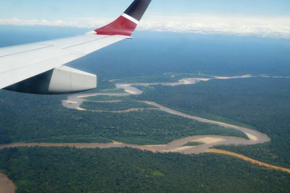 A view of the amazon from an airplane window.