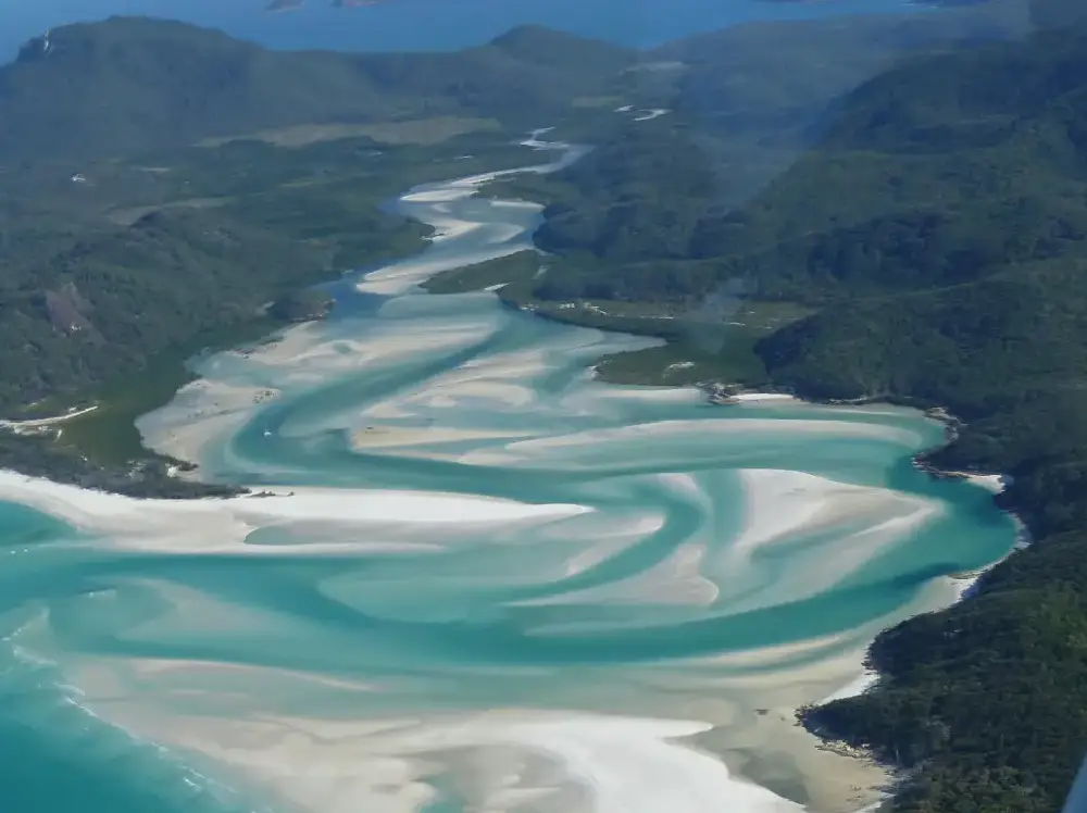 A river flowing through the middle of a valley.